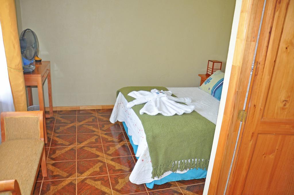 Hotel Tekarera - Kainga Nui Χάνγκα Ρόα Δωμάτιο φωτογραφία