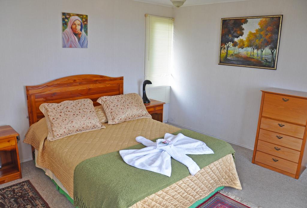 Hotel Tekarera - Kainga Nui Χάνγκα Ρόα Δωμάτιο φωτογραφία